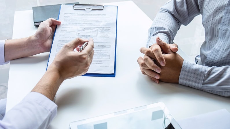 Psychiatrist reviewing medication options with a patient in Ohio representing the medication management process at KAV Mental Health